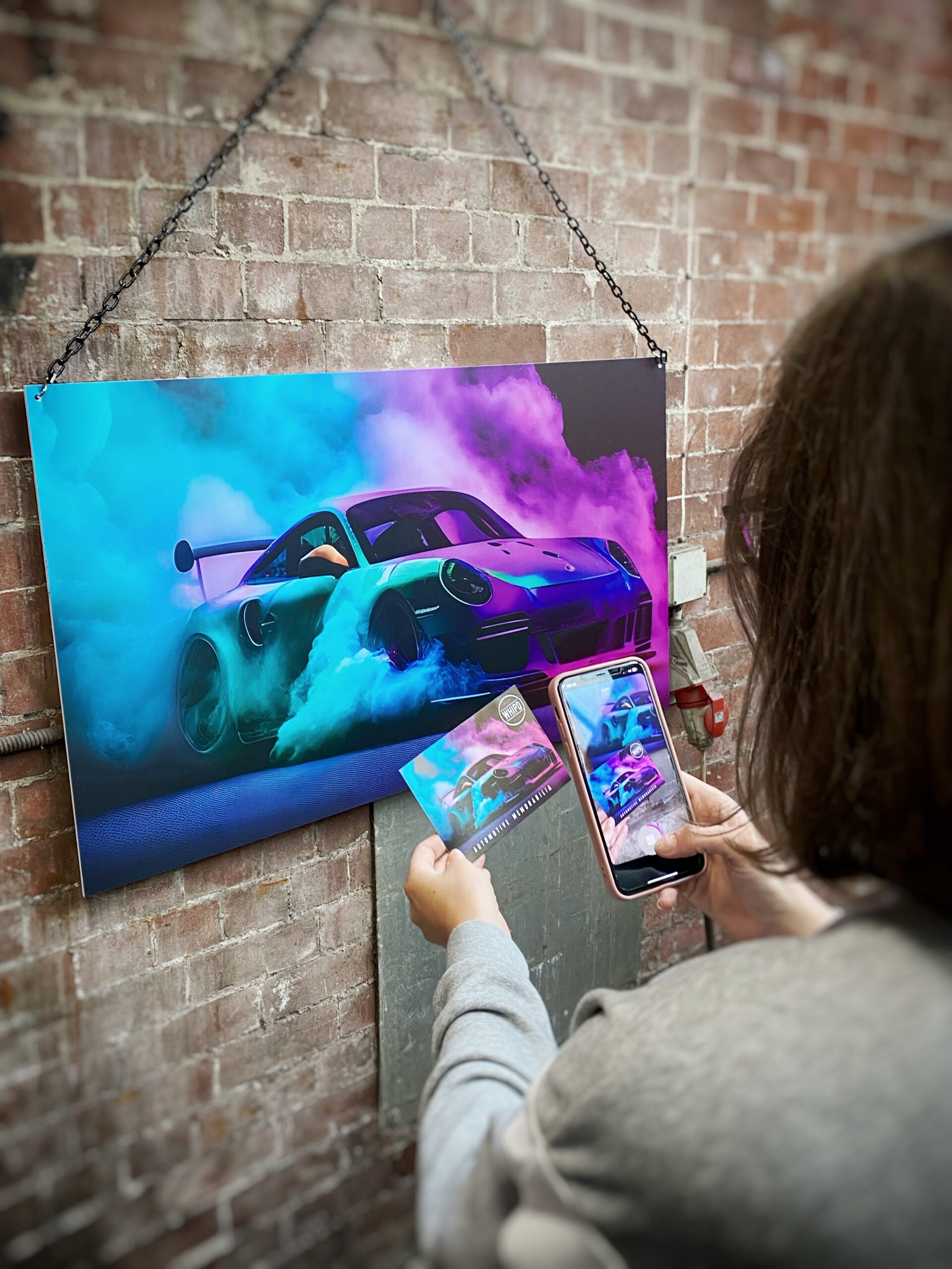 Porsche drift smoke neon wall art chain hung close up Porsche drift smoke neon wall art chain hung close up