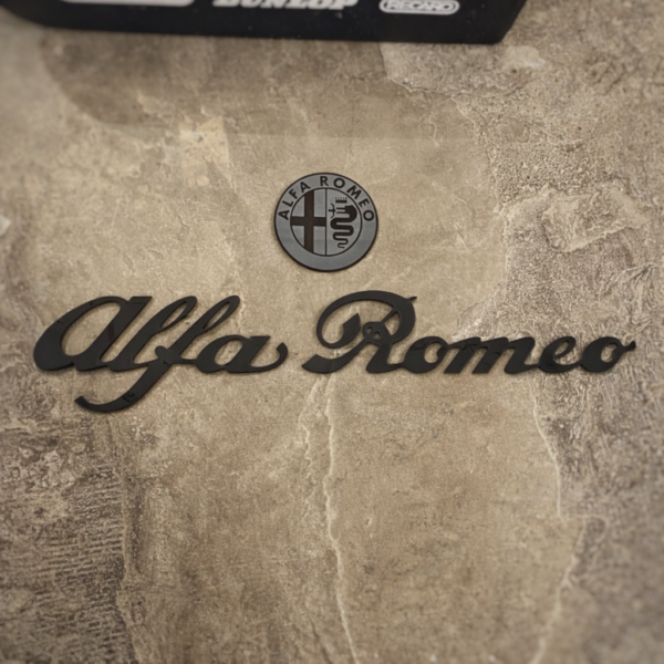 Alfa Romeo Sign On Textured Wall