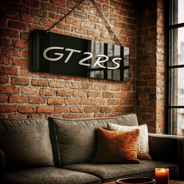 GT2RS gloss black engraved wall sign in high-gloss acrylic displayed in premium garage interior