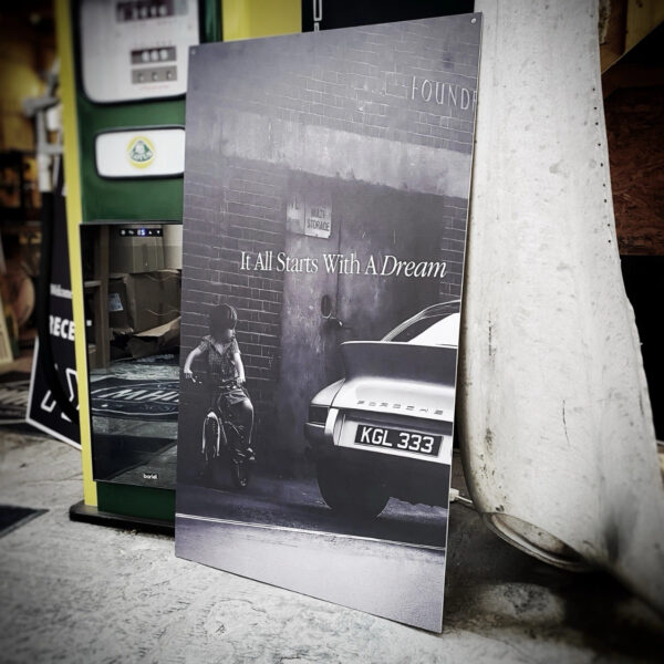 Porsche inspired black and white wall art displayed in performance car garage